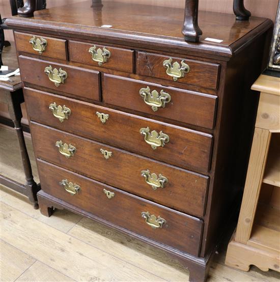 An 18th century style oak chest, of five short and three long drawers, W.90cm